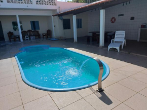 Casa de praia Aruana com piscina